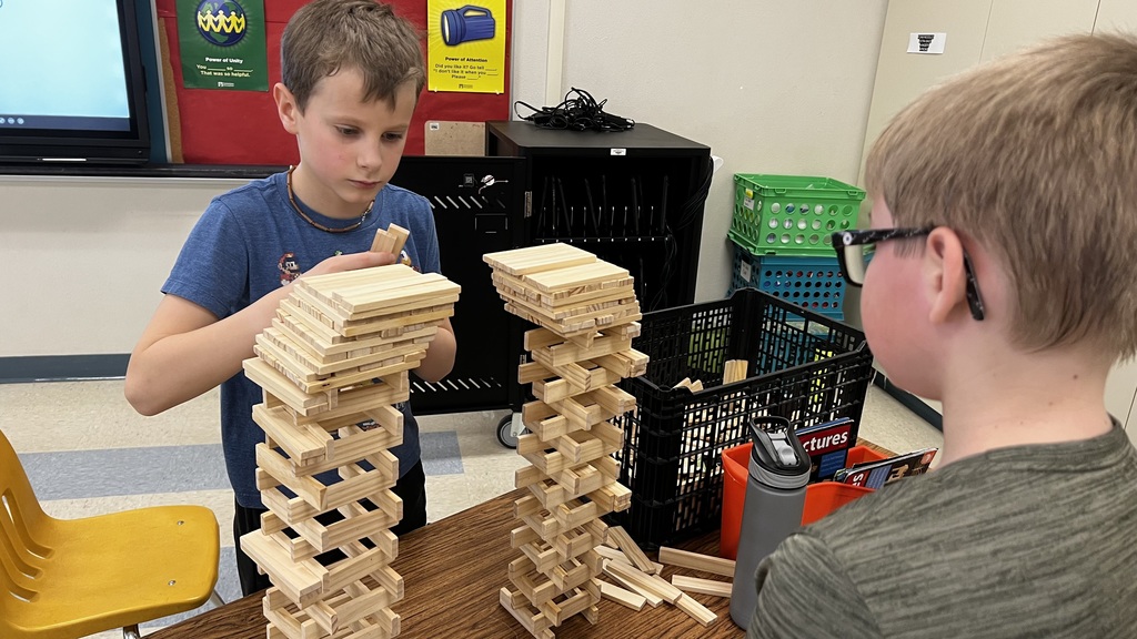 Students building a tower