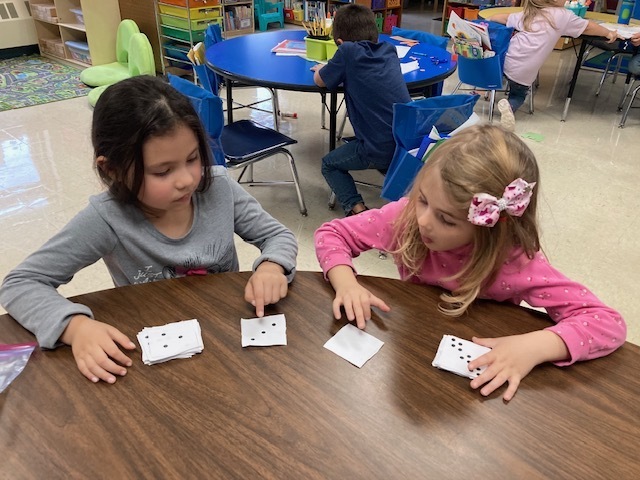 Students learning with cards