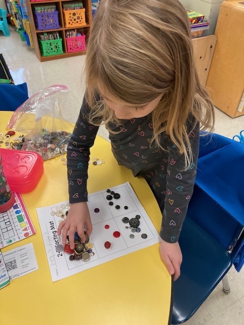 student learning with buttons
