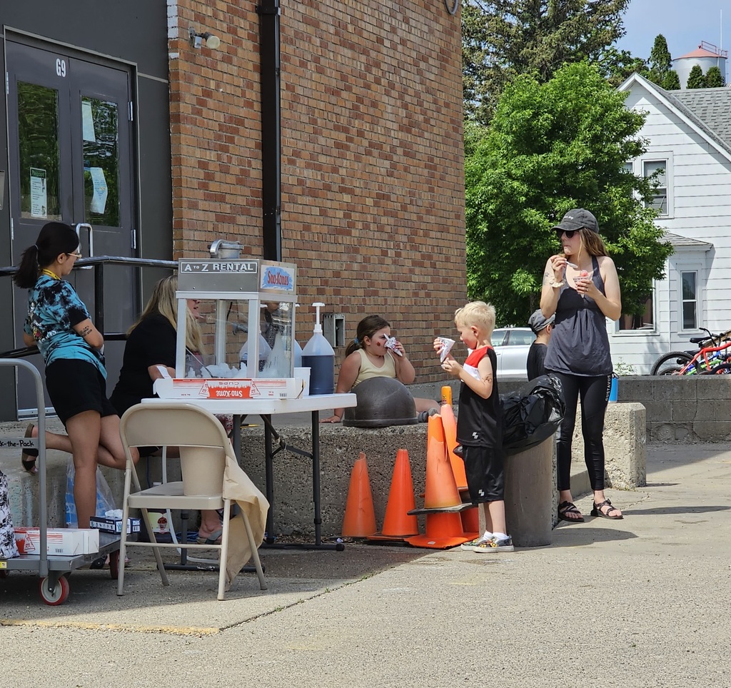 students and teachers with sno cones