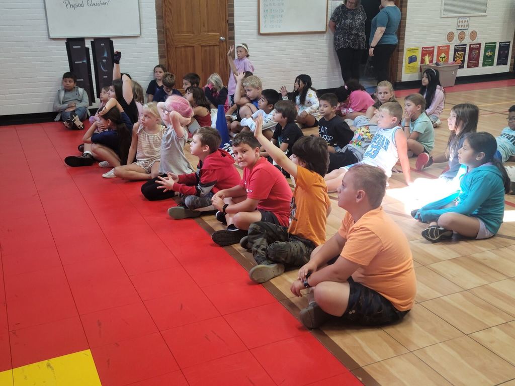 Teacher and students in a presentation